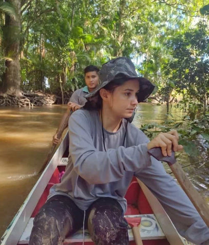 angela paddling a canoe