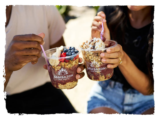 Two customers enjoying their freshly made Acai bowls