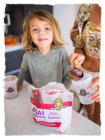 kid eating acai smoothie cubes